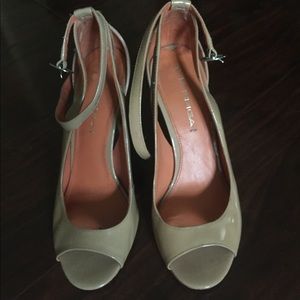 Beige patent strapped heels